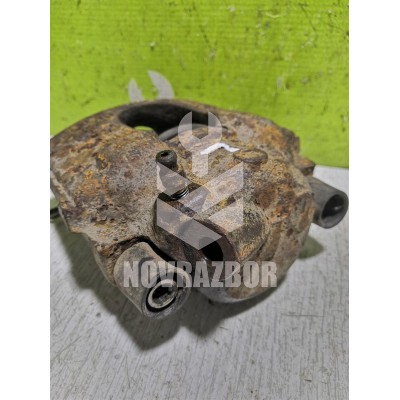 Суппорт передний левый Kia Sephia Shuma 1996-2001