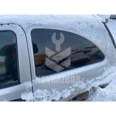 Стекло кузовное глухое левое Opel Corsa C 2000-2006