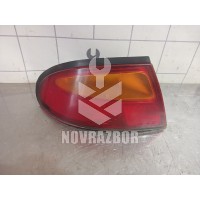 Фонарь задний левый Mazda 323 BA 94-98