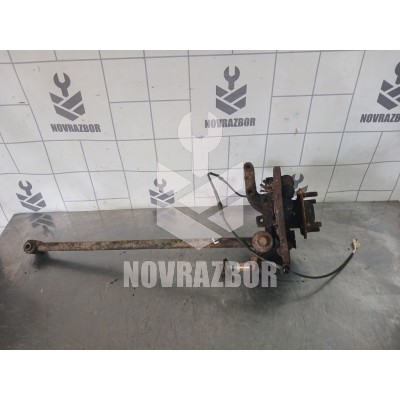 Кулак поворотный задний левый Mazda 323 BA 94-98