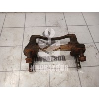 Скоба суппорта переднего Mazda 626 (GE) 1992-1997