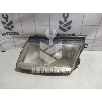 Фара левая VW Passat B5 96-00